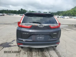 2018 Honda CR-V Touring with VIN 2HKRW2H91JH688325, listed as a Copart auction lot 63619555 with 124,962 mi miles and Salvage title. Bid and sale history available at DreamBid. Image 6.