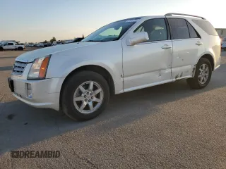 2009 Cadillac SRX RWD z VIN 1GYEE637490111726, wystawiony jako Copart lot #51984775 z przebiegiem 155 257 mil mil oraz Szkoda całkowita • Salvage title. Historia ofert i sprzedaży dostępna na DreamBid. Obrazek 1.