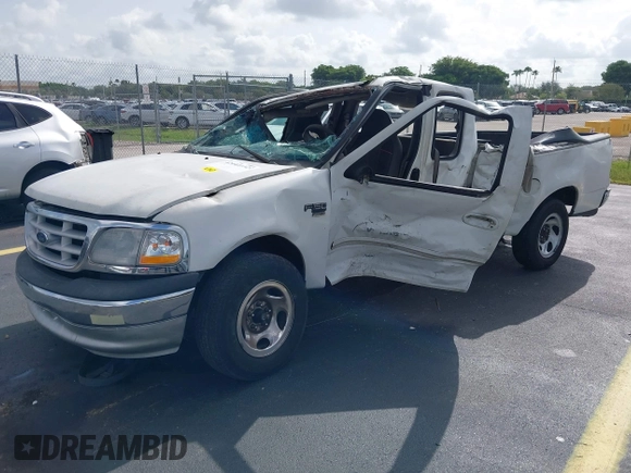 1999 Ford F-150 with VIN 1FTRX17W6XNB65695, listed as a IAAI auction lot 42444132 with Not provided miles and . Bid and sale history available at DreamBid. Image 18.