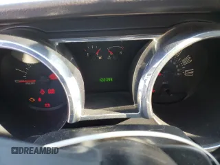 2009 Ford Mustang with VIN 1ZVHT80N595106302, listed as a Copart auction lot 45233005 with 122,399 mi miles and Salvage Title. Bid and sale history available at carsss.com. Image 9.