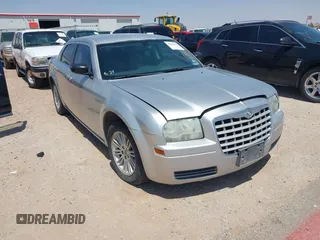 2009 Chrysler 300 LX z VIN 2C3KA43D19H500466, wystawiony jako IAAI lot #42354134 z przebiegiem 149 463 mil mil oraz . Historia ofert i sprzedaży dostępna na DreamBid. Obrazek 1.