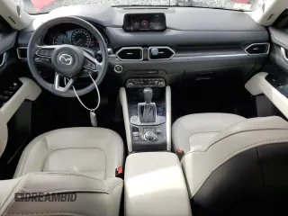 2019 Mazda CX-5 Grand Touring with VIN JM3KFBDM1K0559891, listed as a Copart auction lot 58775275 with 45,126 mi miles and Salvage title. Bid and sale history available at DreamBid. Image 8.