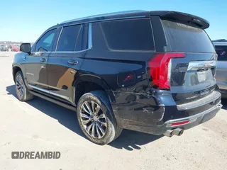 2021 GMC Yukon Denali with VIN 1GKS2DKL1MR135771, listed as a IAAI auction lot 41403680 with 61,772 mi miles. Bid and sale history available at carsss.com. Image 3.