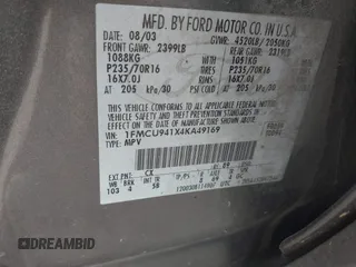 2004 Ford Escape Limited z VIN 1FMCU941X4KA49169, wystawiony jako IAAI lot #42491024 z przebiegiem 310 880 mil mil oraz . Historia ofert i sprzedaży dostępna na DreamBid. Obrazek 9.
