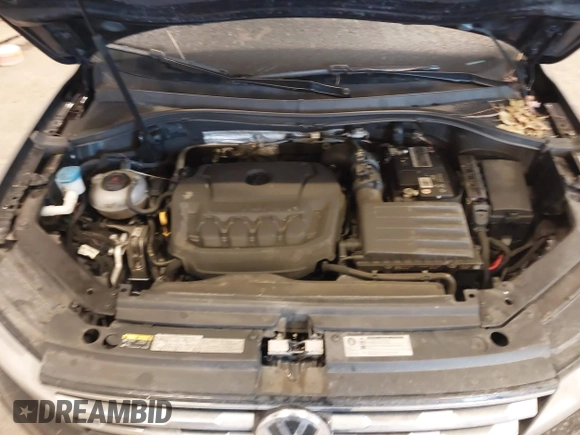 2019 Volkswagen Tiguan S with VIN 3VV0B7AX3KM182311, listed as a IAAI auction lot 41727114 with 98,035 mi miles and . Bid and sale history available at DreamBid. Image 10.