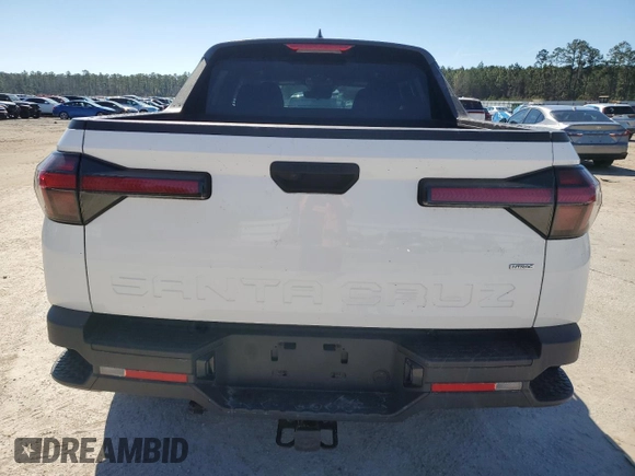 2022 Hyundai Santa Cruz SEL z VIN 5NTJBDAE5NH014097, wystawiony jako Copart lot #46309765 z przebiegiem 24 938 mil mil oraz Szkoda całkowita • Salvage title. Historia ofert i sprzedaży dostępna na DreamBid. Obrazek 6.