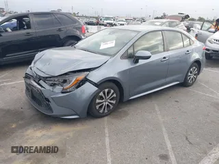 2022 Toyota Corolla Hybrid LE with VIN JTDEAMDE4NJ041913, listed as a IAAI auction lot 41883490 with 23,063 mi miles. Bid and sale history available at carsss.com. Image 17.