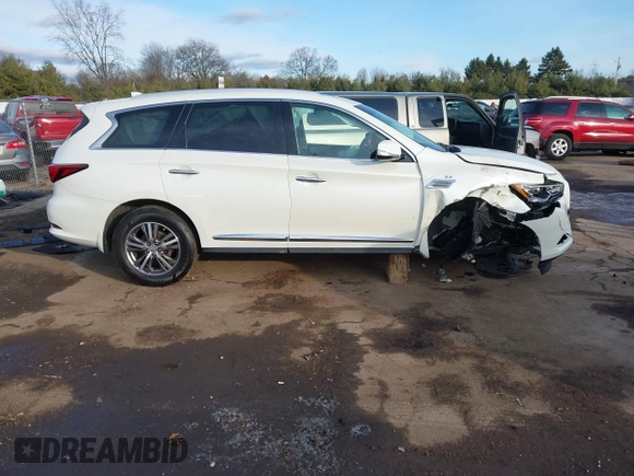2016 Infiniti QX60 with VIN 5N1AL0MM8GC515986, listed as a IAAI auction lot 41223590 with 99,789 mi miles and . Bid and sale history available at DreamBid. Image 14.