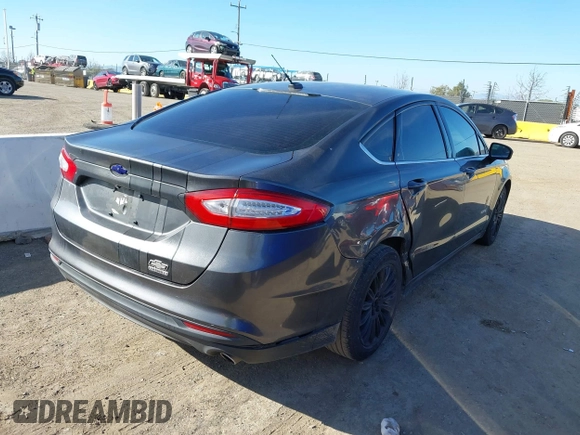 2015 Ford Fusion S Hybrid with VIN 3FA6P0UU2FR105754, listed as a IAAI auction lot 41631104 with 185,114 mi miles. Bid and sale history available at carsss.com. Image 4.