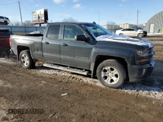 2017 Chevrolet Silverado 1500 LT with VIN 1GCVKREC8HZ223773, listed as a Copart auction lot 46084865 with 135,279 mi miles and Salvage Title. Bid and sale history available at DreamBid. Image 4.