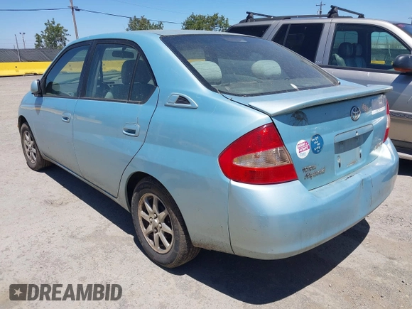2003 Toyota Prius z VIN JT2BK12U130071262, wystawiony jako IAAI lot #42333933 z przebiegiem 314 553 mil mil oraz . Historia ofert i sprzedaży dostępna na DreamBid. Obrazek 3.