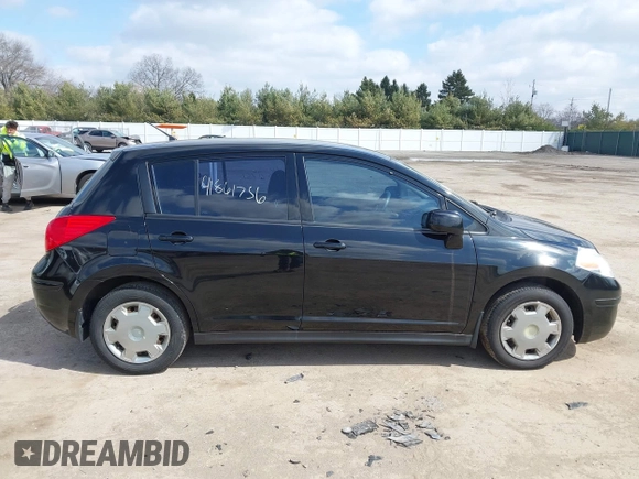 2012 Nissan Versa S with VIN 3N1BC1CP9CK290446, listed as a IAAI auction lot 41861756 with 124,883 mi miles. Bid and sale history available at carsss.com. Image 13.
