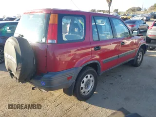 1998 Honda CR-V LX with VIN JHLRD1845WC065039, listed as a IAAI auction lot 41459730 with 197,664 mi miles. Bid and sale history available at carsss.com. Image 4.
