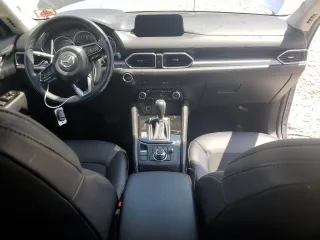 2018 Mazda CX-5 Touring with VIN JM3KFBCMXJ0460020, listed as a Copart auction lot 55997305 with 56,361 mi miles and Salvage Title. Bid and sale history available at DreamBid. Image 8.