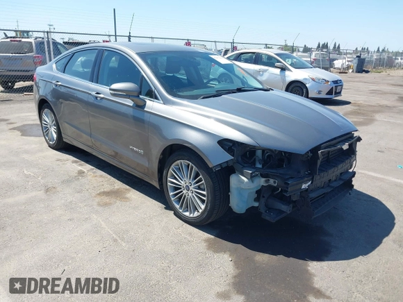2014 Ford Fusion SE Hybrid with VIN 3FA6P0LU5ER393530, listed as a IAAI auction lot 42478440 with 93,728 mi miles and . Bid and sale history available at DreamBid. Image 1.