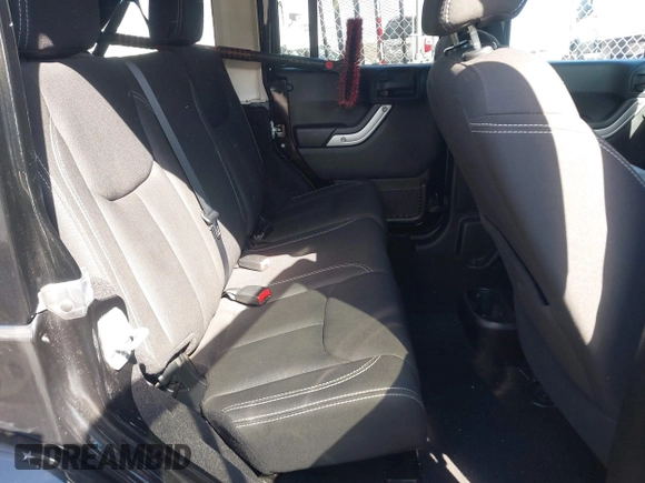 2015 Jeep Wrangler Unlimited Sahara with VIN 1C4BJWEGXFL506361, listed as a IAAI auction lot 41865418 with 80,841 mi miles. Bid and sale history available at carsss.com. Image 8.