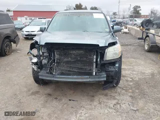 2006 Honda Pilot EX-L with RES with VIN 2HKYF18646H555514, listed as a IAAI auction lot 41703223 with 292,487 mi miles. Bid and sale history available at carsss.com. Image 6.