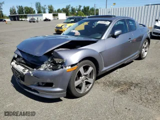 2004 Mazda RX-8 with VIN JM1FE173940114831, listed as a Copart auction lot 69443824 with 0 mi miles and Salvage Title. Bid and sale history available at carsss.com. Image 1.