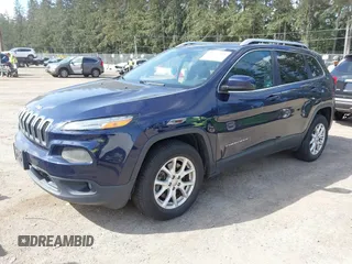 2015 Jeep Cherokee Latitude with VIN 1C4PJMCB0FW702535, listed as a IAAI auction lot 42149898 with 125,938 mi miles and . Bid and sale history available at carsss.com. Image 22.