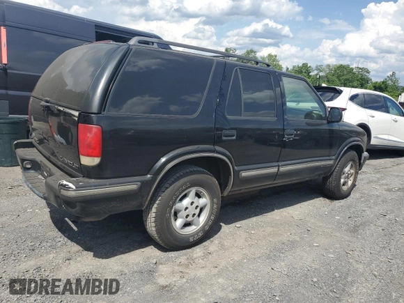 1998 Chevrolet Blazer LS with VIN 1GNDT13W6W2102082, listed as a Copart auction lot 61773115 with Not provided miles and Clean title. Bid and sale history available at DreamBid. Image 3.