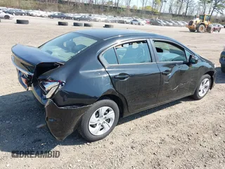 2014 Honda Civic Sedan LX with VIN 19XFB2F55EE219490, listed as a IAAI auction lot 42104202 with 142,638 mi miles. Bid and sale history available at carsss.com. Image 4.