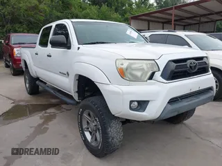 2013 Toyota Tacoma PreRunner z VIN 5TFKU4HN8DX003844, wystawiony jako IAAI lot #42466968 z przebiegiem 183 234 mil mil oraz . Historia ofert i sprzedaży dostępna na DreamBid. Obrazek 1.