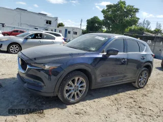 2021 Mazda CX-5 Grand Touring with VIN JM3KFBDM4M1462570, listed as a Copart auction lot 54827675 with 45,389 mi miles and Salvage Title. Bid and sale history available at DreamBid. Image 1.