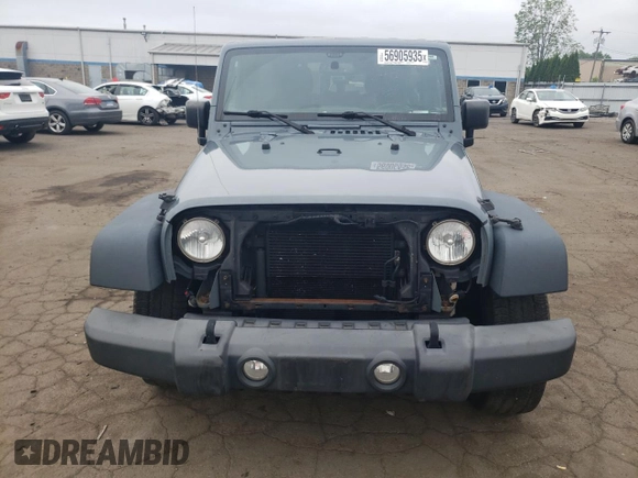 2015 Jeep Wrangler Unlimited Sport with VIN 1C4BJWDGXFL551284, listed as a Copart auction lot 56905935 with 155,988 mi miles and Salvage title. Bid and sale history available at DreamBid. Image 5.