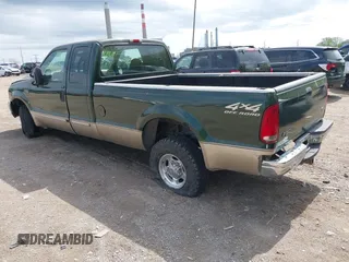 2000 Ford Super Duty F-250 XL with VIN 1FTNX21F9YED75853, listed as a IAAI auction lot 42152135 with 212,078 mi miles. Bid and sale history available at carsss.com. Image 3.