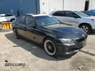 2015 BMW 3 Series 328i xDrive with VIN WBA3B5C59FP653564, listed as a Copart auction lot 64702115 with 92,821 mi miles and Salvage title. Bid and sale history available at DreamBid. Image 4.