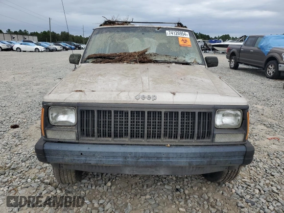 1995 Jeep Cherokee Sport with VIN 1J4FJ68S4SL618773, listed as a Copart auction lot 74126954 with 318,519 mi miles and Salvage title. Bid and sale history available at DreamBid. Image 5.