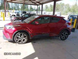 2018 Toyota C-HR XLE with VIN NMTKHMBX6JR027381, listed as a IAAI auction lot 42149905 with 118,897 mi miles and . Bid and sale history available at DreamBid. Image 14.
