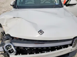 2023 Rivian R1S Adventure z VIN 7PDSGABA4PN026056, wystawiony jako Copart lot #56892495 z przebiegiem Nie podano mil oraz Szkoda całkowita • Salvage title. Historia ofert i sprzedaży dostępna na DreamBid. Obrazek 12.