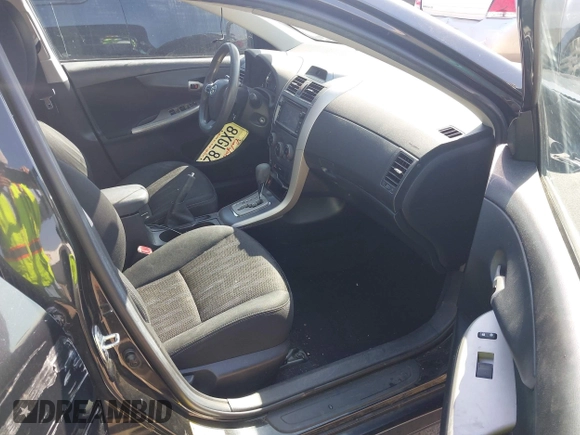 2013 Toyota Corolla L with VIN 5YFBU4EE3DP181535, listed as a IAAI auction lot 42174504 with 119,025 mi miles. Bid and sale history available at carsss.com. Image 5.