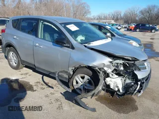 2015 Toyota RAV4 LE with VIN JTMBFREV8FJ050857, listed as a IAAI auction lot 41319739 with 144,441 mi miles. Bid and sale history available at carsss.com. Image 1.