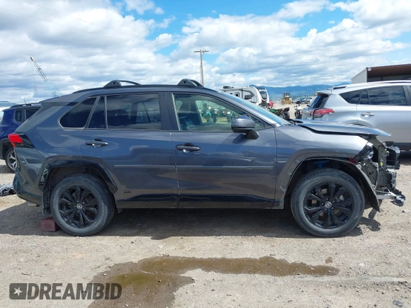 2022 Toyota RAV4 Hybrid SE with VIN JTM16RFV0ND070012, listed as a IAAI auction lot 42244604 with 22,740 mi miles and . Bid and sale history available at DreamBid. Image 14.