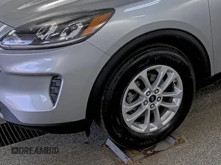 2022 Ford Escape SE with VIN 1FMCU9G64NUB33193, listed as a IAAI auction lot 42733930 with 73,871 mi miles and . Bid and sale history available at DreamBid. Image 28.