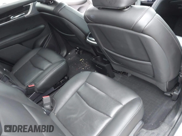 2021 Cadillac XT6 Premium Luxury z VIN 1GYKPCRSXMZ169206, wystawiony jako IAAI lot #41581841 z przebiegiem 64 789 mil mil oraz . Historia ofert i sprzedaży dostępna na DreamBid. Obrazek 8.