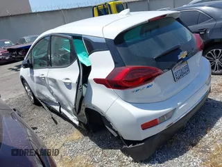 2020 Chevrolet Bolt EV LT with VIN 1G1FY6S03L4132176, listed as a IAAI auction lot 42211304 with 62,063 mi miles and . Bid and sale history available at DreamBid. Image 3.
