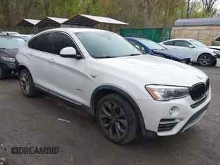 2018 BMW X4 xDrive28i with VIN 5UXXW3C57J0T82081, listed as a IAAI auction lot 41991254 with 100,654 mi miles. Bid and sale history available at carsss.com. Image 1.