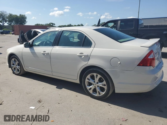 2012 Ford Fusion SE z VIN 3FAHP0HA7CR133859, wystawiony jako Copart lot #61153125 z przebiegiem 100 822 mil mil oraz Czysty tytuł • Clean title. Historia ofert i sprzedaży dostępna na DreamBid. Obrazek 2.