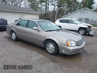 2002 Cadillac DeVille with VIN 1G6KD54Y32U108623, listed as a IAAI auction lot 41957171 with 136,941 mi miles. Bid and sale history available at carsss.com. Image 1.