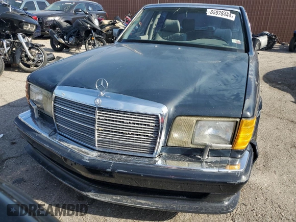 1990 Mercedes-Benz 560 with VIN WDBCA39EXLA503543, listed as a Copart auction lot 65978444 with 195,635 mi miles and Clean Title. Bid and sale history available at DreamBid. Image 5.