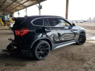 2018 BMW X1 sDrive28i with VIN WBXHU7C34J5L05725, listed as a Copart auction lot 49228475 with 69,994 mi miles and Salvage Title. Bid and sale history available at carsss.com. Image 3.