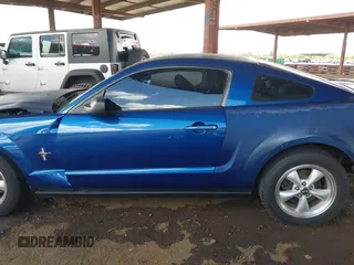 2007 Ford Mustang Deluxe with VIN 1ZVFT80N575334160, listed as a IAAI auction lot 41960332 with 160,283 mi miles. Bid and sale history available at carsss.com. Image 14.
