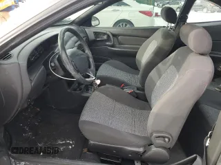 2002 Ford Escort ZX2 Standard with VIN 3FAFP11302R226603, listed as a Copart auction lot 87861115 with 77,245 mi miles and Salvage Title. Bid and sale history available at carsss.com. Image 7.