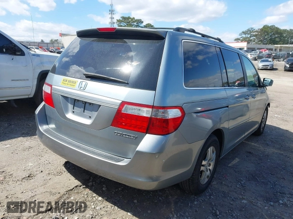 2005 Honda Odyssey EX-L with VIN 5FNRL38645B134981, listed as a IAAI auction lot 41847669 with 153,864 mi miles. Bid and sale history available at carsss.com. Image 4.
