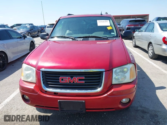 2005 GMC Envoy SLT with VIN 1GKDS13SX52144959, listed as a IAAI auction lot 41968495 with 238,199 mi miles. Bid and sale history available at carsss.com. Image 12.