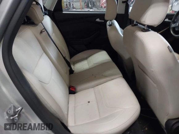 2018 Ford Focus Titanium with VIN 1FADP3N25JL261736, listed as a IAAI auction lot 41032128 with 59,142 mi miles and . Bid and sale history available at DreamBid. Image 8.
