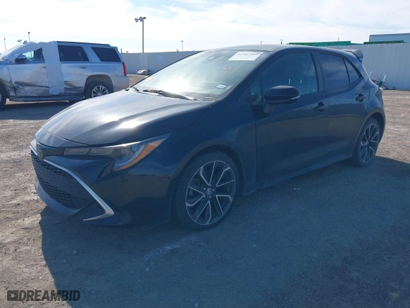 2019 Toyota Corolla Hatchback SE with VIN JTNK4RBE7K3057934, listed as a IAAI auction lot 41347395 with 76,949 mi miles. Bid and sale history available at carsss.com. Image 17.